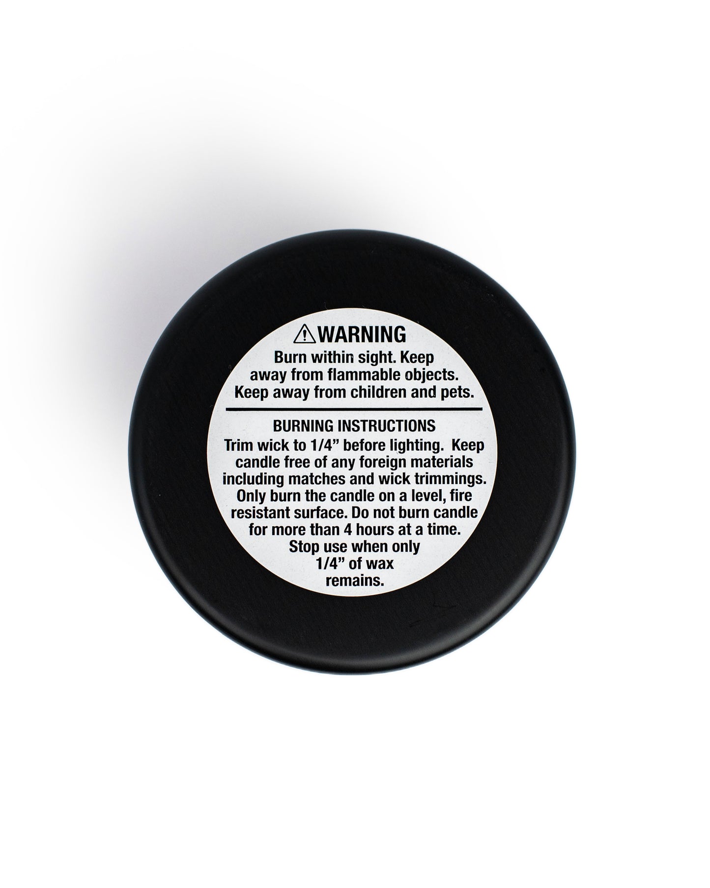 Warning label and burning instructions for Soy Wax Candles, emphasizing safety and proper use guidelines.
