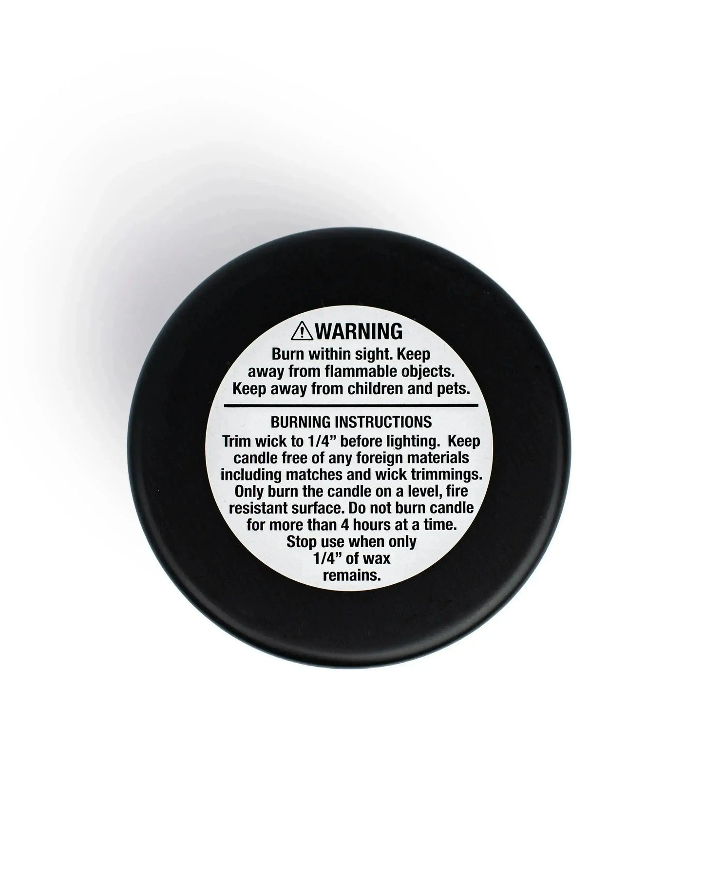 Warning label and burning instructions for Soy Wax Candles, emphasizing safety and proper use guidelines.