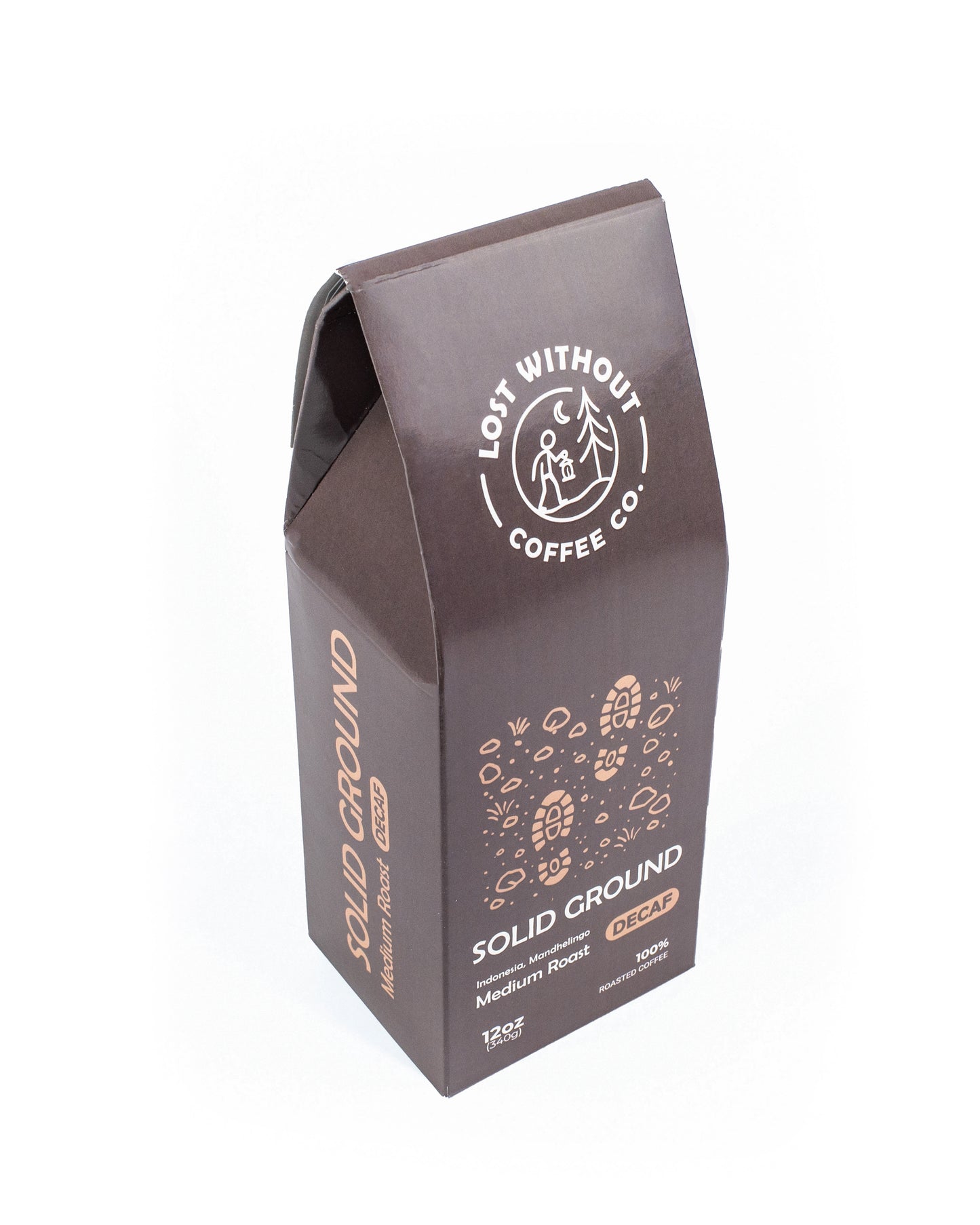 Fresh Roasted Decaf coffee packaging from Solid Ground, featuring medium roast notes and a stylish design.