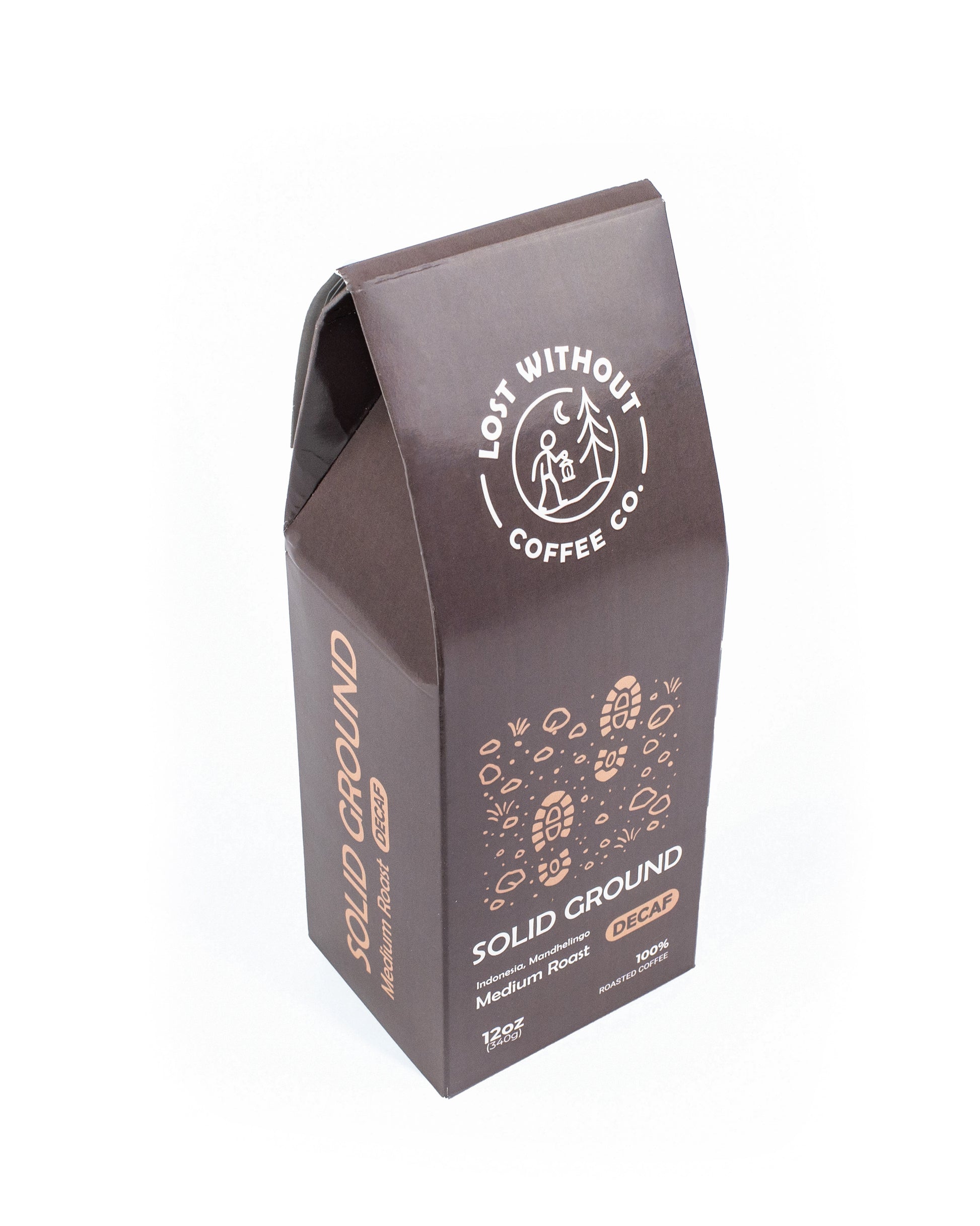 Fresh Roasted Decaf coffee packaging from Solid Ground, featuring medium roast notes and a stylish design.