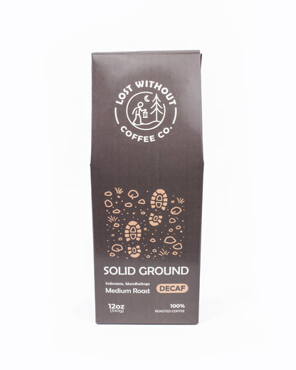 Solid Ground 12oz Fresh Roasted Decaf coffee packaging from Lost Without Coffee Co.