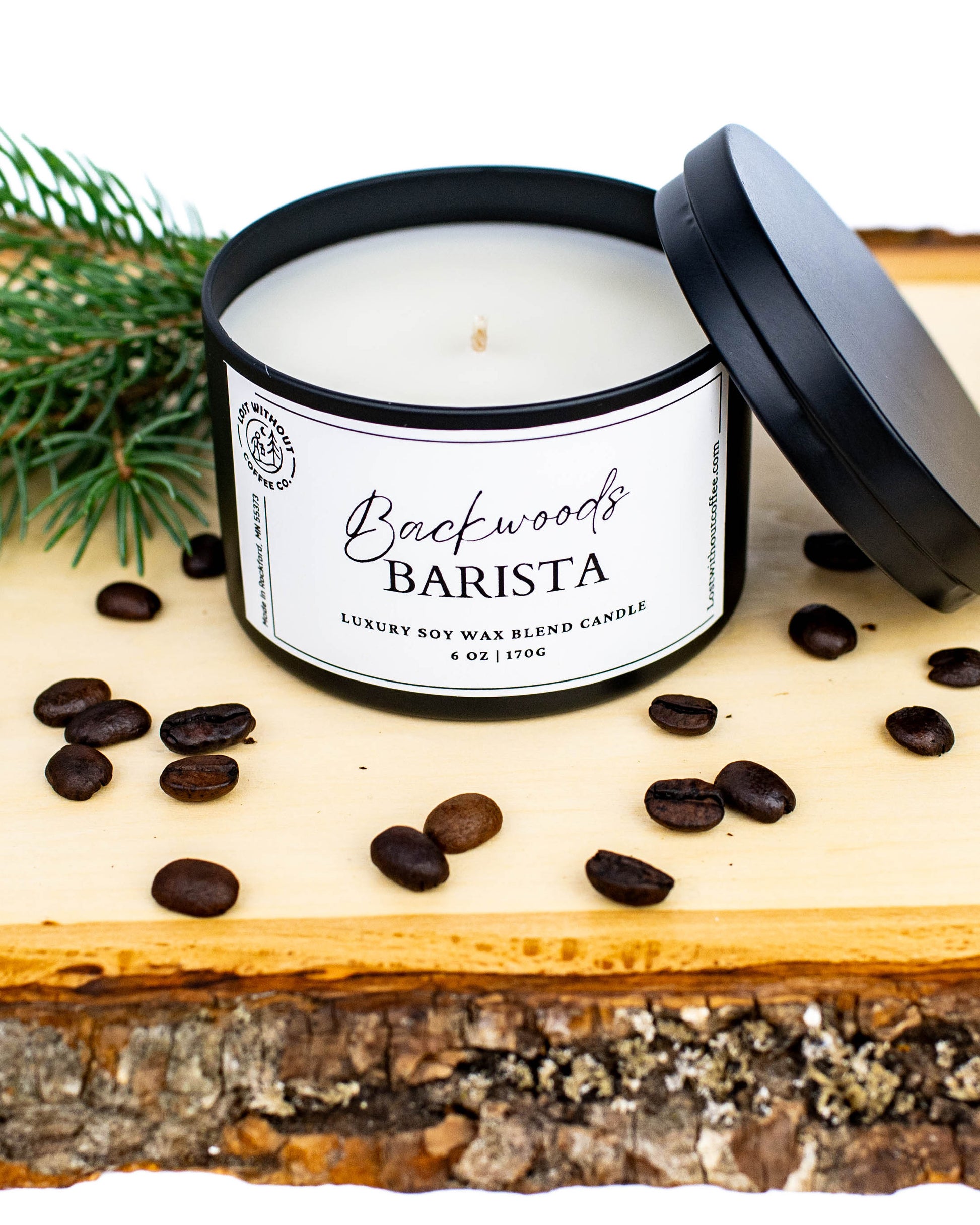 Soy Wax Candles - Backwoods Barista 6oz coffee scented candle on wood with coffee beans.