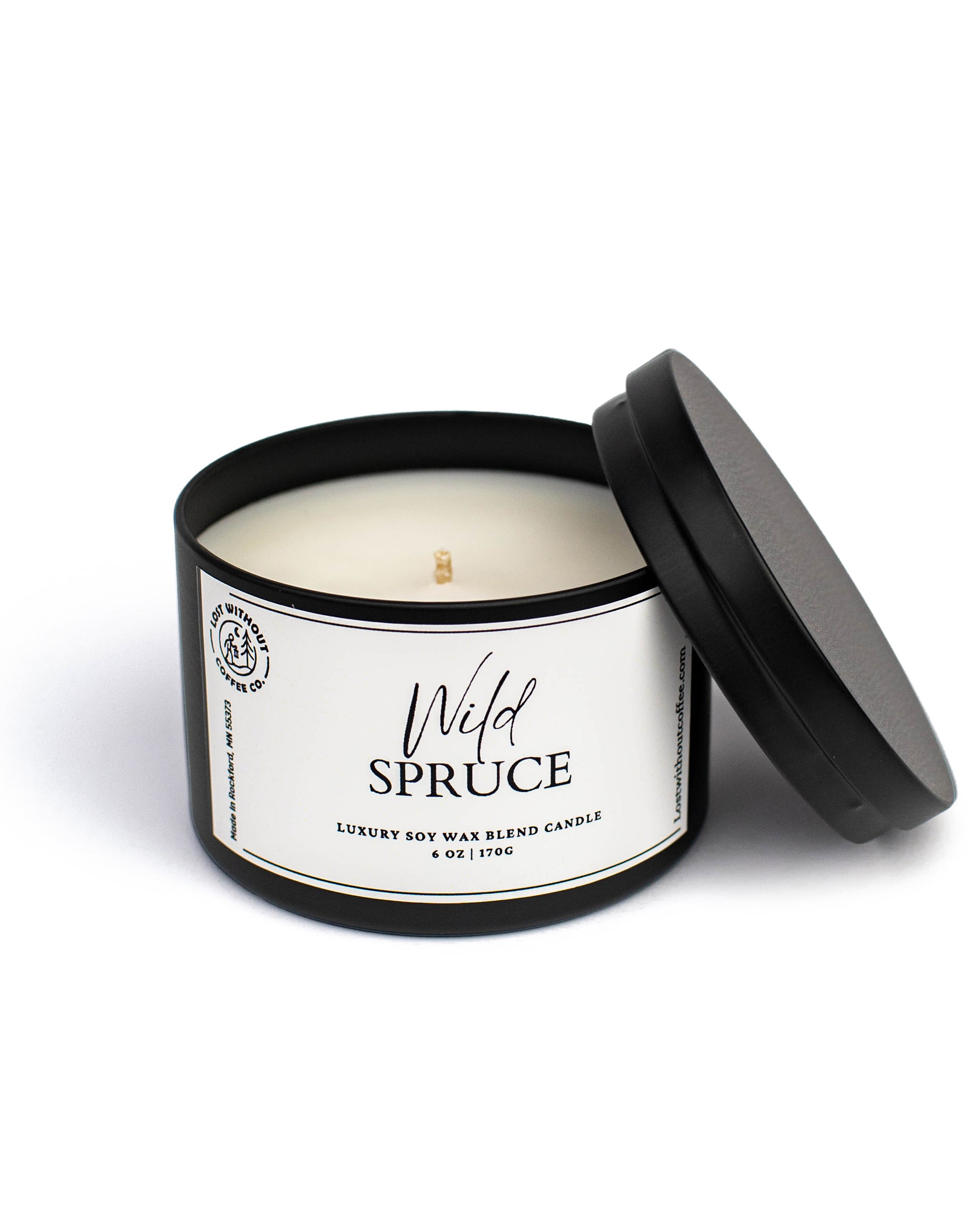 Soy Wax Candles | 6oz Wild Spruce candle in a black tin with lid open, showcasing a luxurious design.