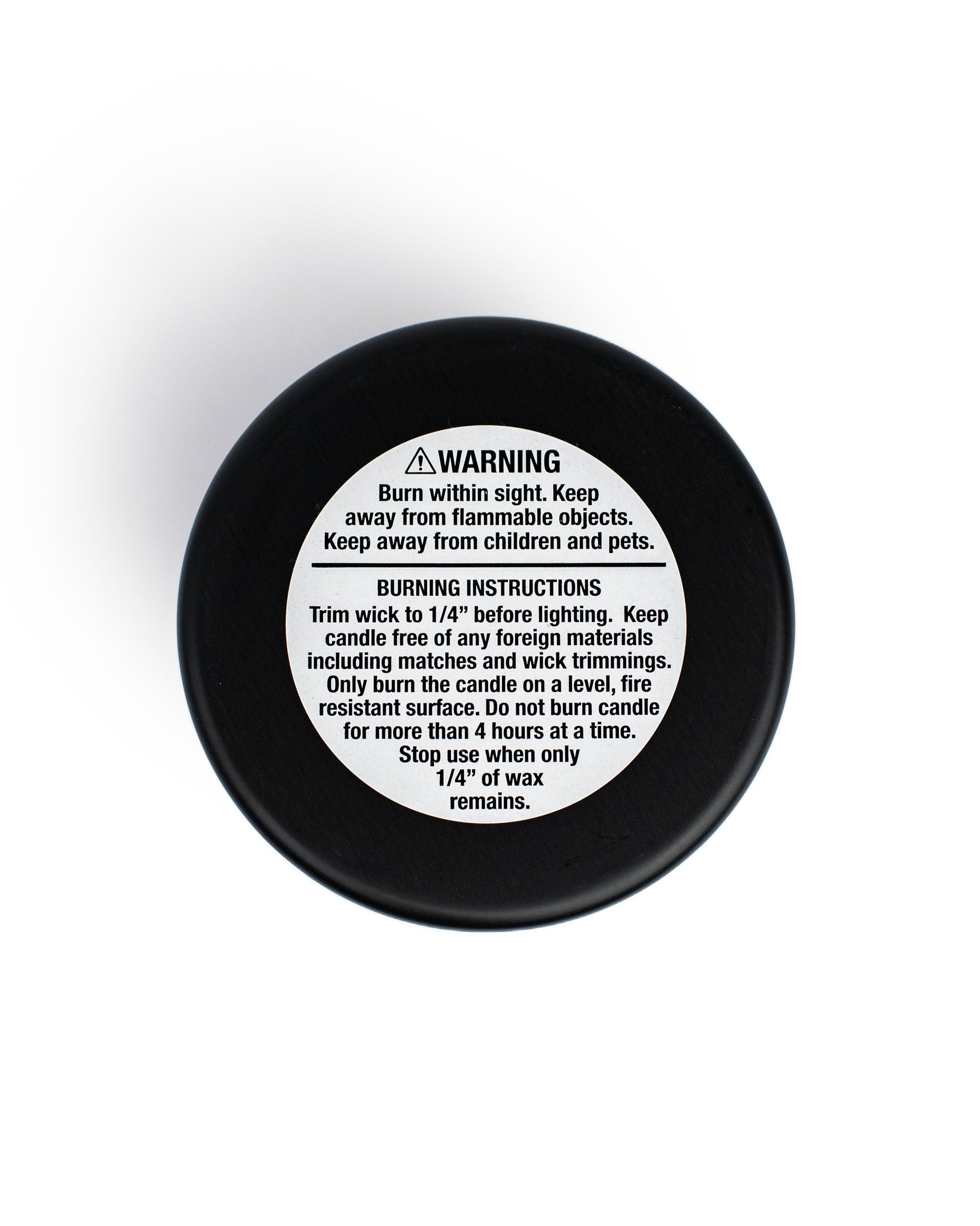 Warning label and burning instructions for Soy Wax Candles, emphasizing safety and proper use guidelines.