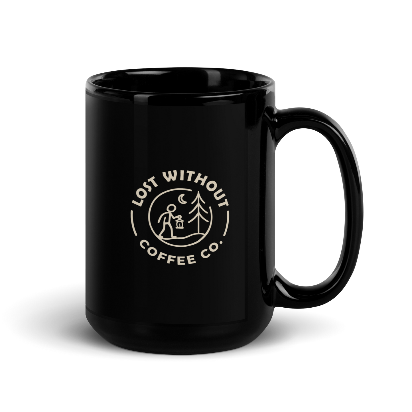 Black ceramic coffee mug with "Lost Without Coffee Co" logo and outdoor scene, ideal for coffee lovers.